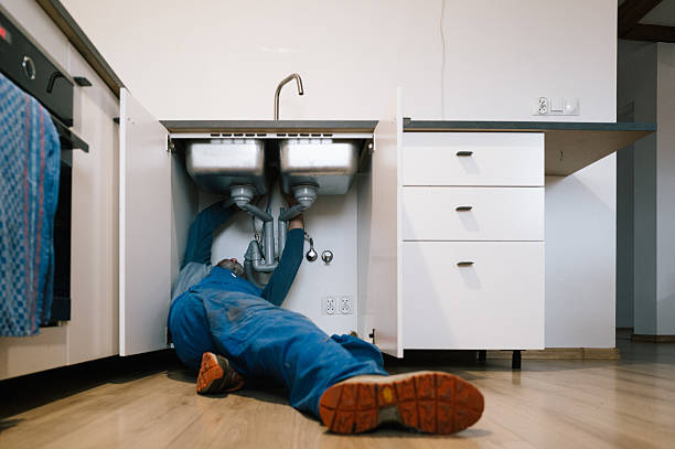 Professional Emergency Plumber technician working in Mitchellville, MD
